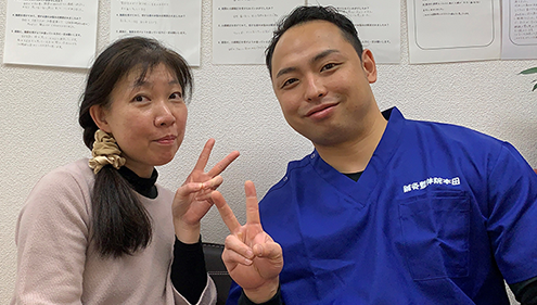 腰痛に悩む40代女性